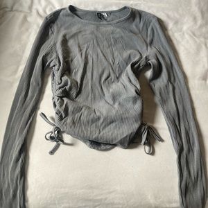 Grey long sleeve tie on the sides top